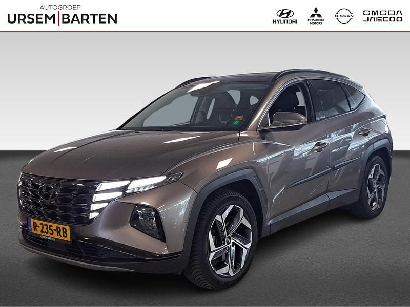 Bruin Gebruikt 2022 Hyundai Tucson Premium SUV | € 29.430 (Eerlijke prijs) - Afbeelding 1/4