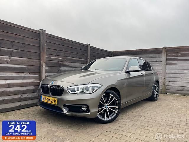 Grijs Gebruikt 2017 BMW 118 Executive Hatchback | € 14.950 (Goede deal) - Afbeelding 1/4