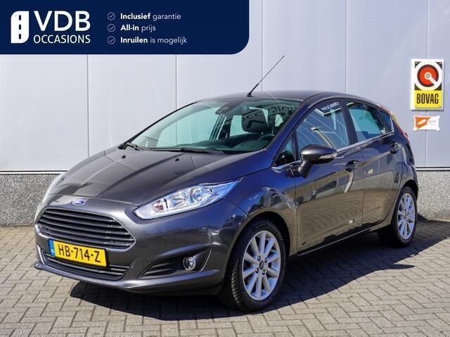 Grijs Gebruikt 2015 Ford Fiesta Titanium Hatchback | € 8.390 (Eerlijke prijs) - Afbeelding 1/4