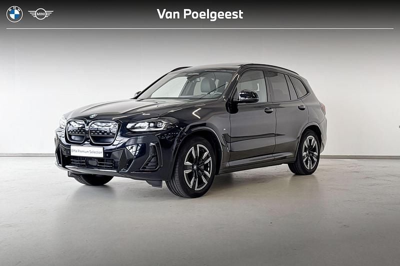M carbonschwarz metallic (donker blauw metallic) Gebruikt 2023 BMW iX3 Executive SUV | € 44.995 (Super prijs) - Afbeelding 1/4