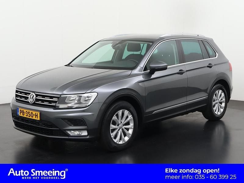 Indium grey metallic Occasion 2017 VW Tiguan Comfortline SUV | € 20.895 (Super prijs) - Afbeelding 1/4