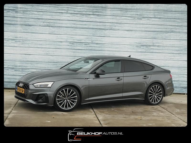 Grijs Gebruikt 2022 Audi A5 Competition Hatchback | € 31.950 (Goede deal) - Afbeelding 1/4