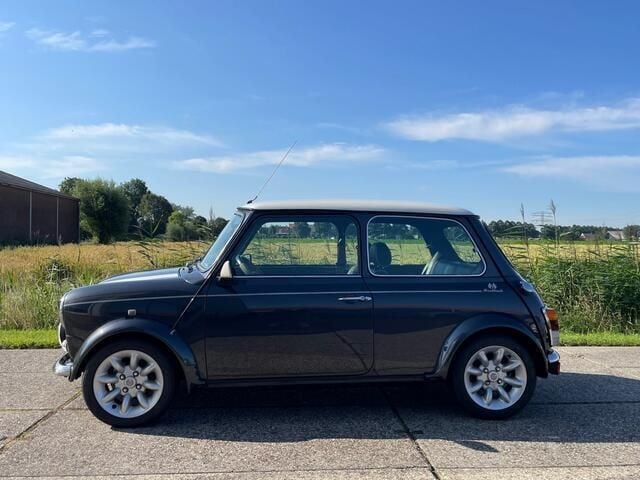Occasion Mini Cooper 63 PK (46 kW) 1998 Zwart Hatchback