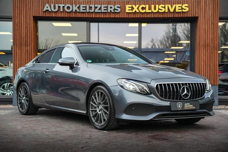 Grijs Occasion 2018 Mercedes E200 Coupé | € 29.900 (Goede deal) - Afbeelding 1/4