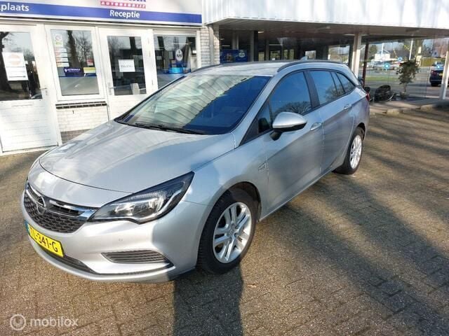 Grijs Gebruikt 2018 Opel Astra Business Stationwagen | € 10.950 (Iets duurder) - Afbeelding 1/4