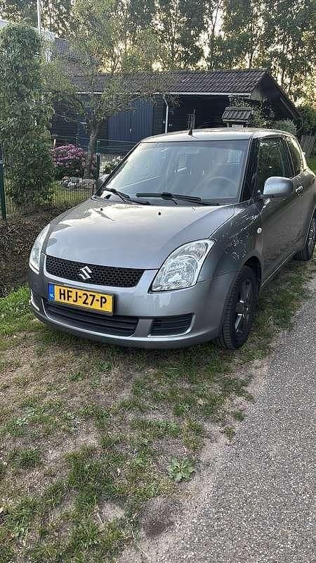 Grijs Gebruikt 2009 Suzuki Swift Exclusive Hatchback | € 3.500 (Eerlijke prijs) - Afbeelding 1/2