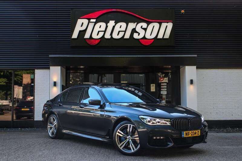 Grijs Gebruikt 2015 BMW 750L Executive Sedan | € 33.750 (Eerlijke prijs) - Afbeelding 1/4