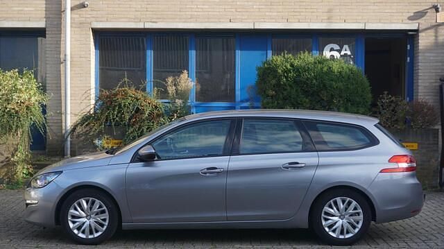 Grijs Gebruikt 2016 Peugeot 308 Stationwagen | € 5.450 (Super prijs) - Afbeelding 1/4