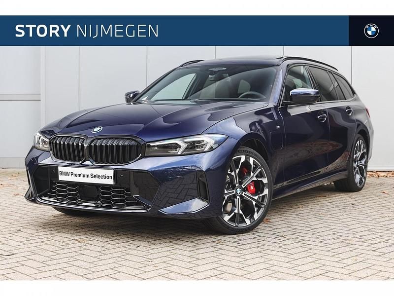Tansanit (blauw metallic) Gebruikt 2025 BMW 330e Executive Stationwagen | € 74.701 - Afbeelding 1/4
