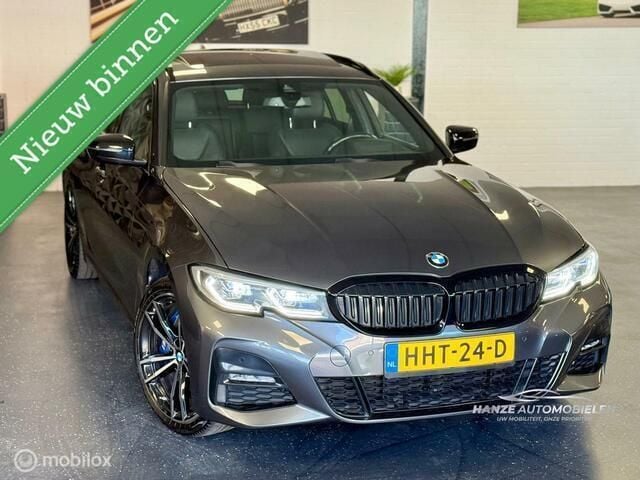 Grijs Gebruikt 2021 BMW 330 Executive Stationwagen | € 31.950 (Goede deal) - Afbeelding 1/4