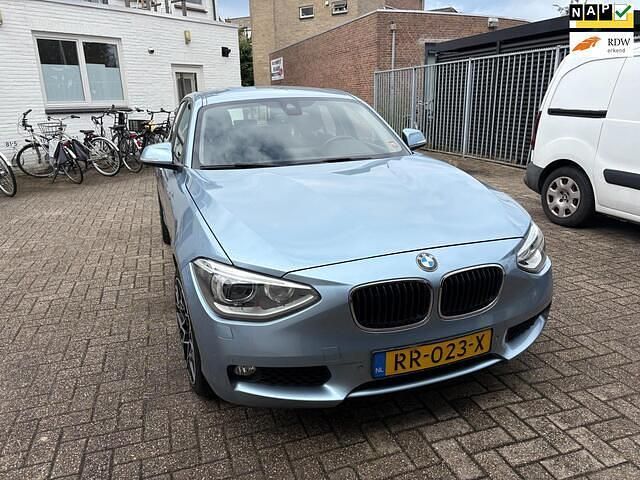 Blauw Gebruikt 2013 BMW 116 Executive Hatchback | € 8.750 (Eerlijke prijs) - Afbeelding 1/4