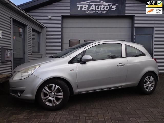 Grijs (metallic) Occasion 2010 Opel Corsa Enjoy Hatchback | € 550 (Super prijs) - Afbeelding 1/4