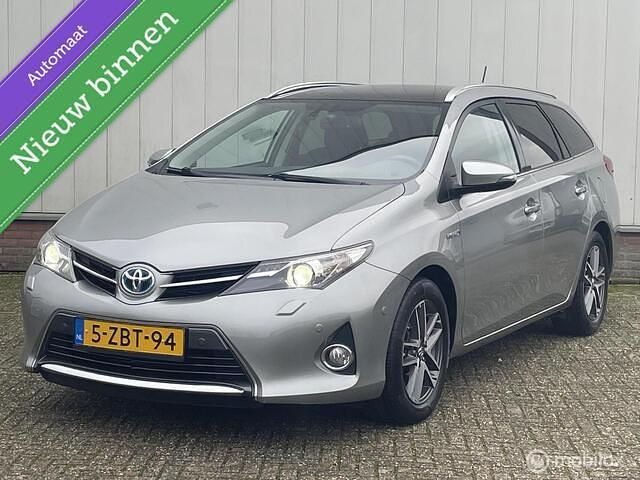 Grijs Gebruikt 2014 Toyota Auris Touring Sports Executive Stationwagen | € 10.495 (Eerlijke prijs) - Afbeelding 1/4