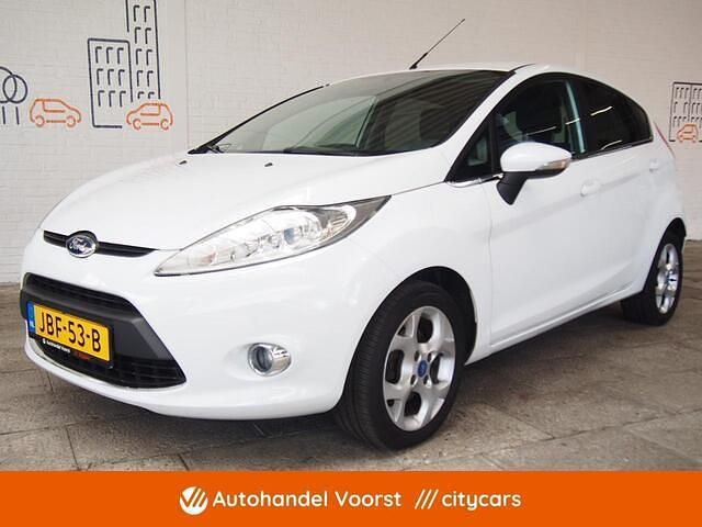 Oranje Gebruikt 2011 Ford Fiesta Titanium Hatchback | € 5.940 (Eerlijke prijs) - Afbeelding 1/4