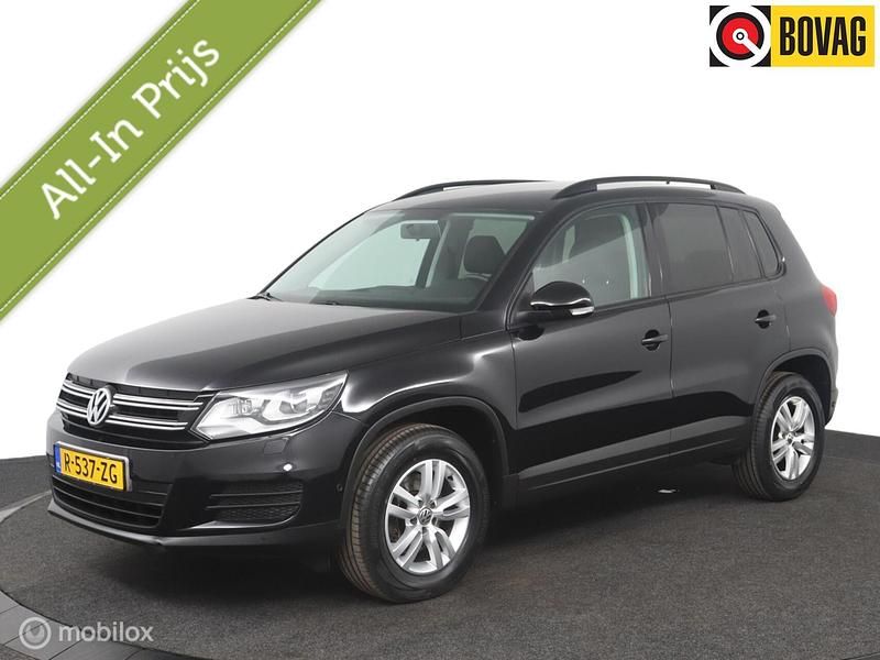 Zwart Gebruikt 2012 VW Tiguan Comfortline SUV | € 9.450 (Eerlijke prijs) - Afbeelding 1/4
