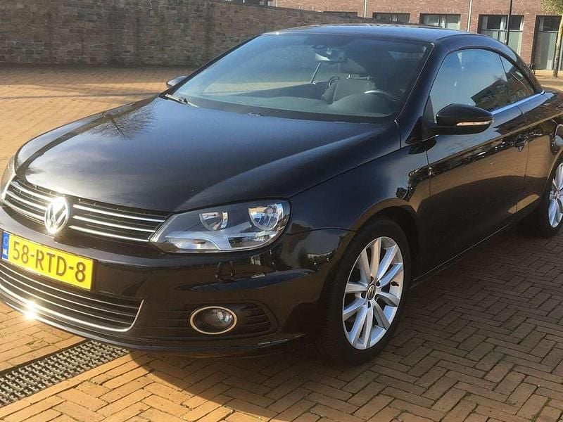 Zwart Gebruikt 2011 VW Eos Highline Cabriolet | € 7.500 (Eerlijke prijs) - Afbeelding 1/4