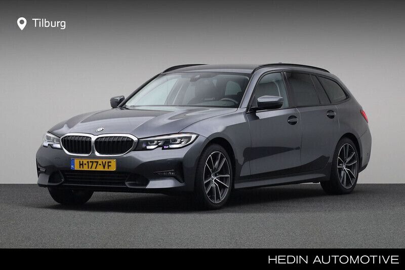 Grijs Gebruikt 2020 BMW 320 Executive Stationwagen | € 29.880 (Goede deal) - Afbeelding 1/4