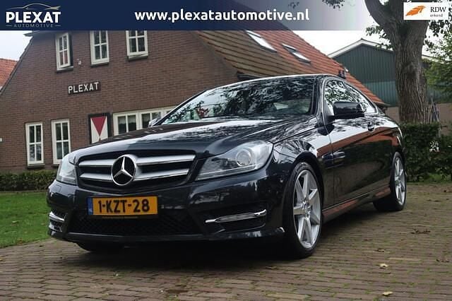 Zwart Gebruikt 2012 Mercedes C180 AMG Coupé | € 13.945 (Eerlijke prijs) - Afbeelding 1/4