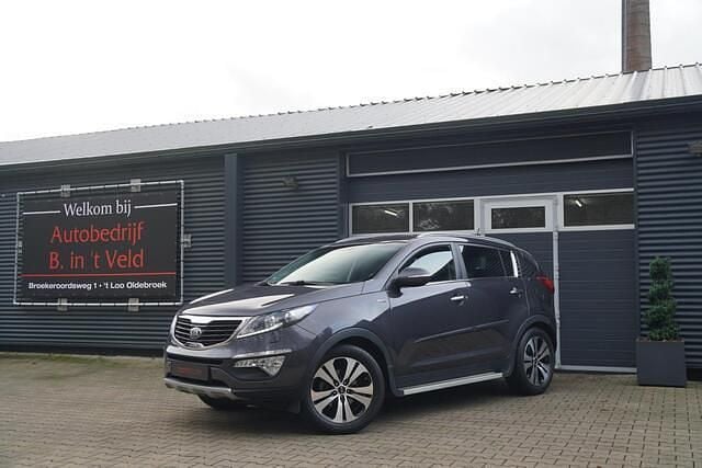 Grijs (metallic) Gebruikt 2013 Kia Sportage SUV | € 12.950 (Goede deal) - Afbeelding 1/4
