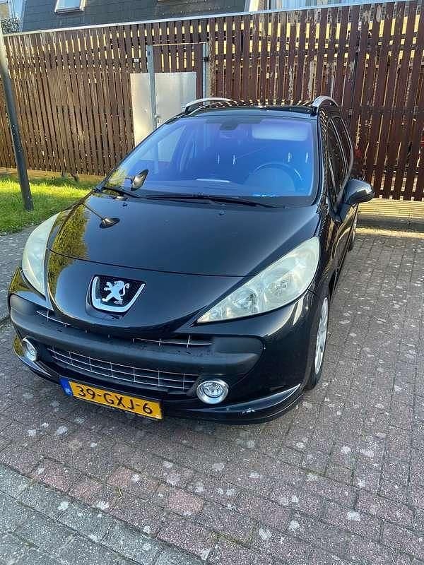 Zwart Gebruikt 2008 Peugeot 207 Stationwagen | € 300 (Super prijs) - Afbeelding 1/4