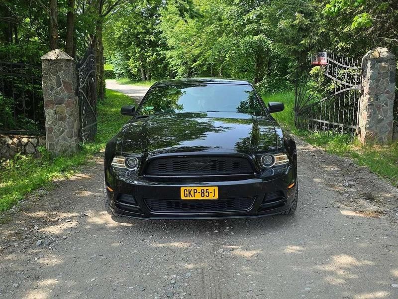 Zwart Occasion 2014 Ford Mustang Coupé | € 21.599 (Goede deal) - Afbeelding 1/4