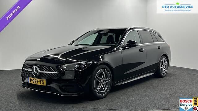 Zwart Gebruikt 2022 Mercedes C180 AMG line Stationwagen | € 35.500 (Eerlijke prijs) - Afbeelding 1/4