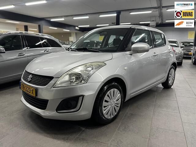 Grijs Occasion 2015 Suzuki Swift Hatchback | € 6.450 (Goede deal) - Afbeelding 1/4