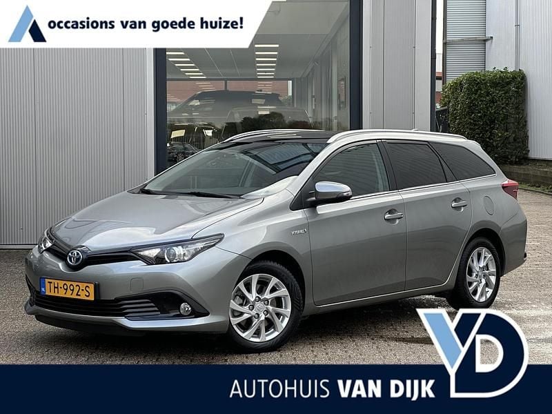 Grijs Gebruikt 2018 Toyota Auris Hybrid Stationwagen | € 18.945 (Eerlijke prijs) - Afbeelding 1/4