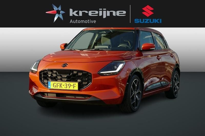 Oranje Occasion 2024 Suzuki Swift Style Hatchback | € 20.925 (Iets duurder) - Afbeelding 1/4