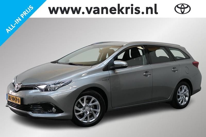 Grijs Gebruikt 2016 Toyota Auris Hybrid Stationwagen | € 16.249 (Iets duurder) - Afbeelding 1/4