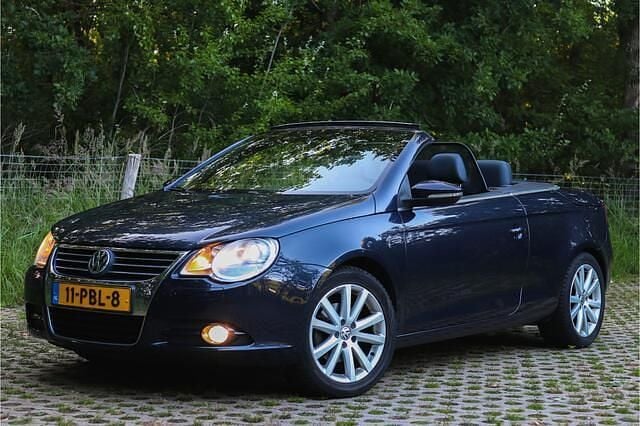 Blauw Gebruikt 2011 VW Eos Highline Cabriolet | € 8.445 (Eerlijke prijs) - Afbeelding 1/4