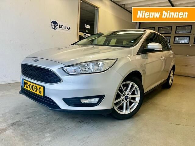Grijs, metallic lak Gebruikt 2016 Ford Focus Titanium Stationwagen | € 6.495 (Eerlijke prijs) - Afbeelding 1/4
