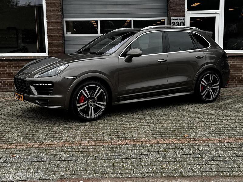 Bruin Gebruikt 2013 Porsche Cayenne SUV | € 23.950 (Eerlijke prijs) - Afbeelding 1/4