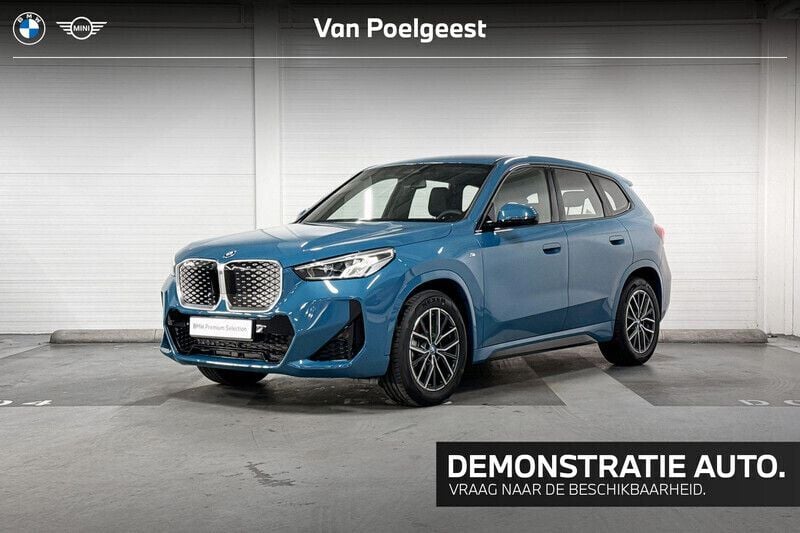 Inidividual blue bay lagoon (donker blauw) Gebruikt 2025 BMW iX1 Comfort Edition SUV | € 42.900 (Super prijs) - Afbeelding 1/4