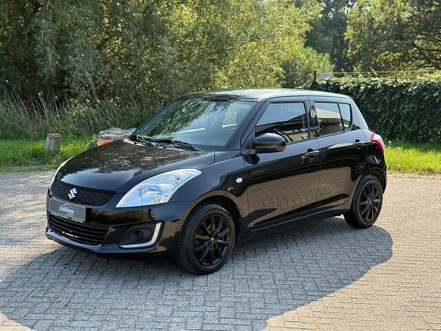 Zwart Gebruikt 2014 Suzuki Swift Exclusive Hatchback | € 7.499 (Eerlijke prijs) - Afbeelding 1/4