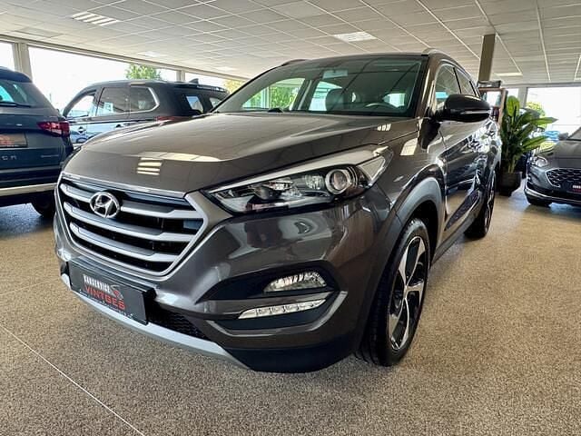 Bruin, metallic lak Gebruikt 2018 Hyundai Tucson Premium SUV | € 21.500 (Goede deal) - Afbeelding 1/4