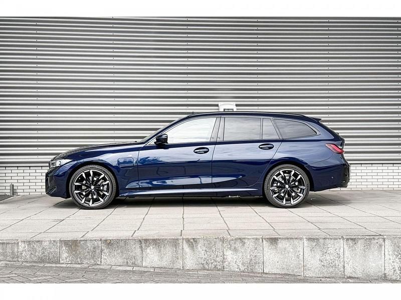 Occasion BMW 330e Basis 292 PK (214 kW) 2025 Bmw individual tansanit metallic (blauw metallic) Stationwagen