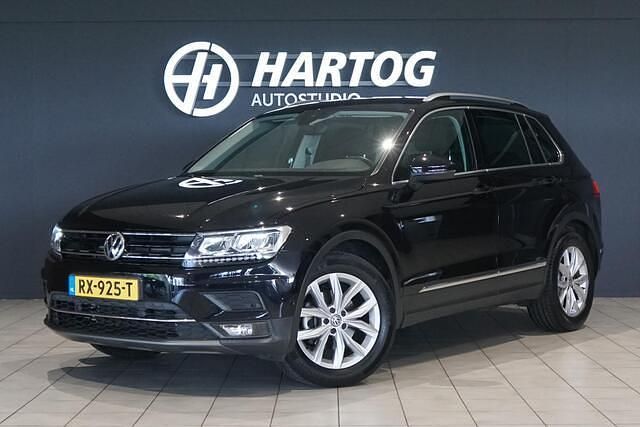 Zwart Gebruikt 2018 VW Tiguan Highline SUV | € 26.850 (Goede deal) - Afbeelding 1/4