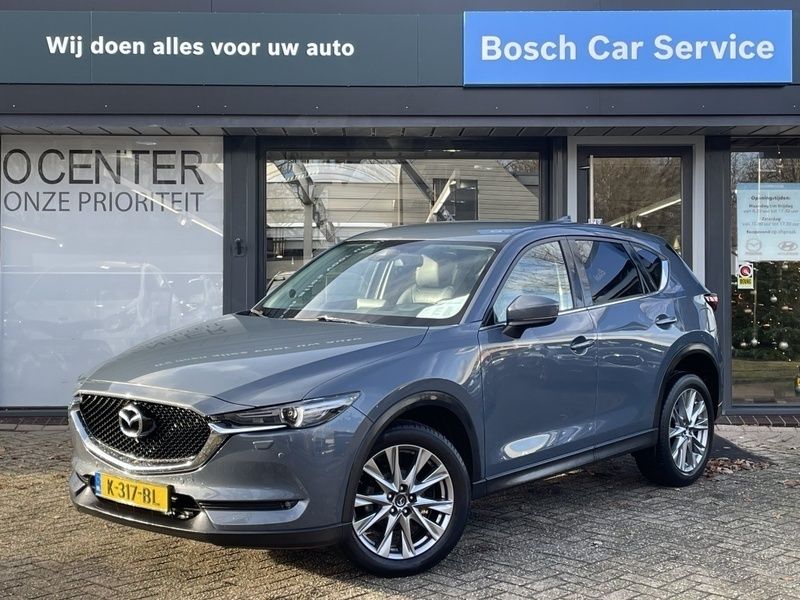 Grijs metallic Gebruikt 2020 Mazda CX-5 Style SUV | € 28.450 (Goede deal) - Afbeelding 1/4