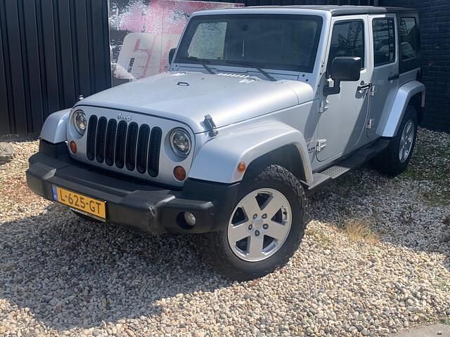 Grijs Gebruikt 2007 Jeep Wrangler Unlimited Sahara SUV | € 27.999 - Afbeelding 1/4