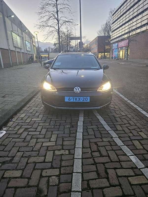 Zwart Gebruikt 2014 VW Golf VII Highline Stationwagen | € 7.500 (Goede deal) - Afbeelding 1/4