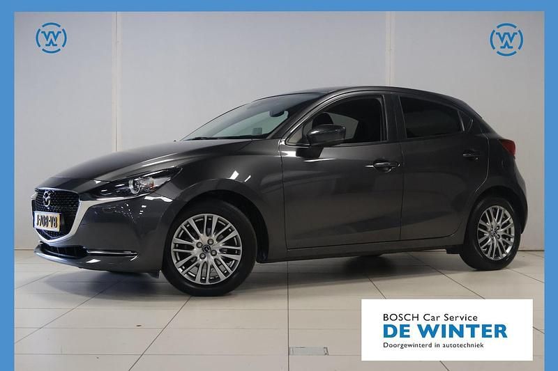 Grijs (metallic) Gebruikt 2020 Mazda 2 Luxury Hatchback | € 16.450 (Eerlijke prijs) - Afbeelding 1/4