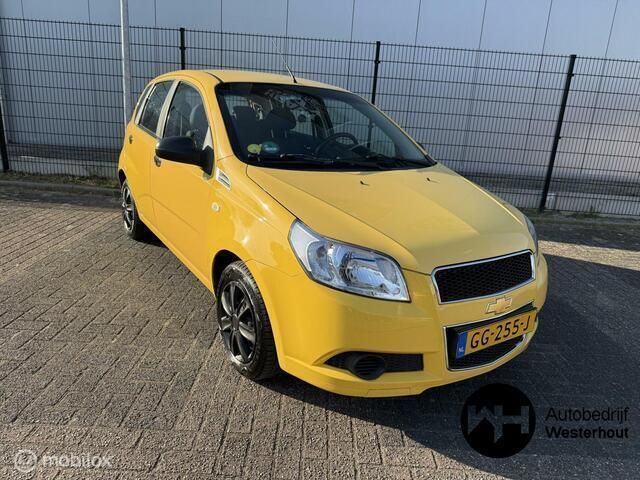 Geel Gebruikt 2009 Chevrolet Aveo Hatchback | € 1.395 (Eerlijke prijs) - Afbeelding 1/4