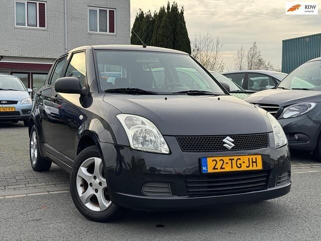 Zwart Gebruikt 2006 Suzuki Swift Hatchback | € 1.600 (Goede deal) - Afbeelding 1/4