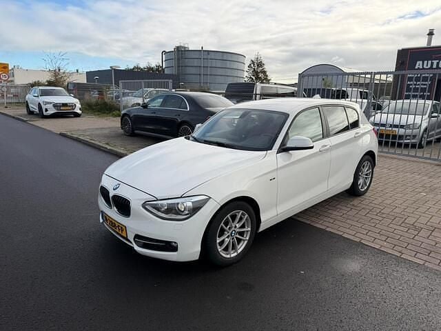 Wit Gebruikt 2012 BMW 116 Hatchback | € 6.250 (Duur) - Afbeelding 1/4