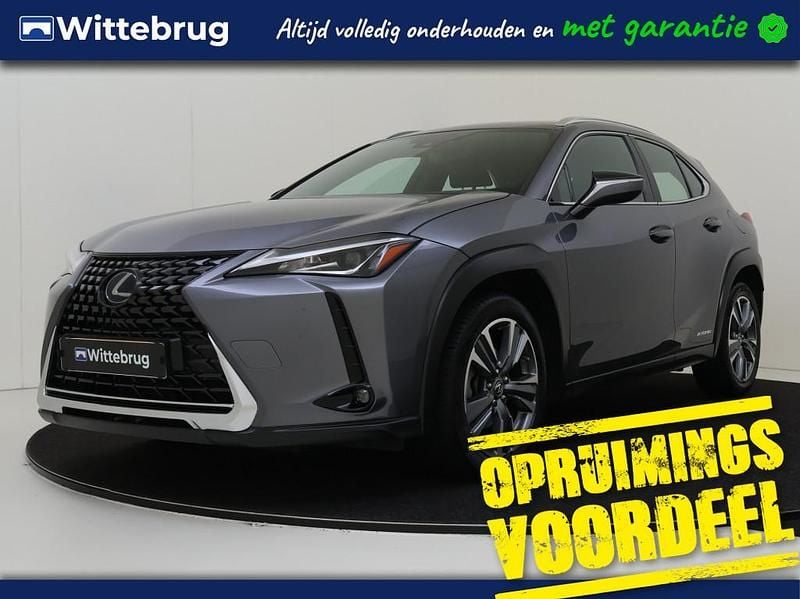 Grijs Gebruikt 2019 Lexus UX 250h Business Edition SUV | € 27.000 (Eerlijke prijs) - Afbeelding 1/3
