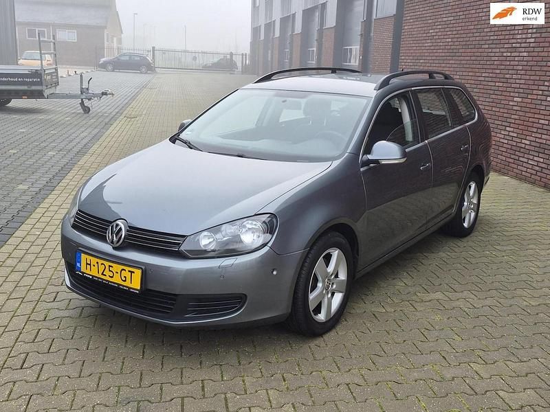 Grijs (metallic) Gebruikt 2012 VW Golf VII Highline Stationwagen | € 5.849 (Super prijs) - Afbeelding 1/4