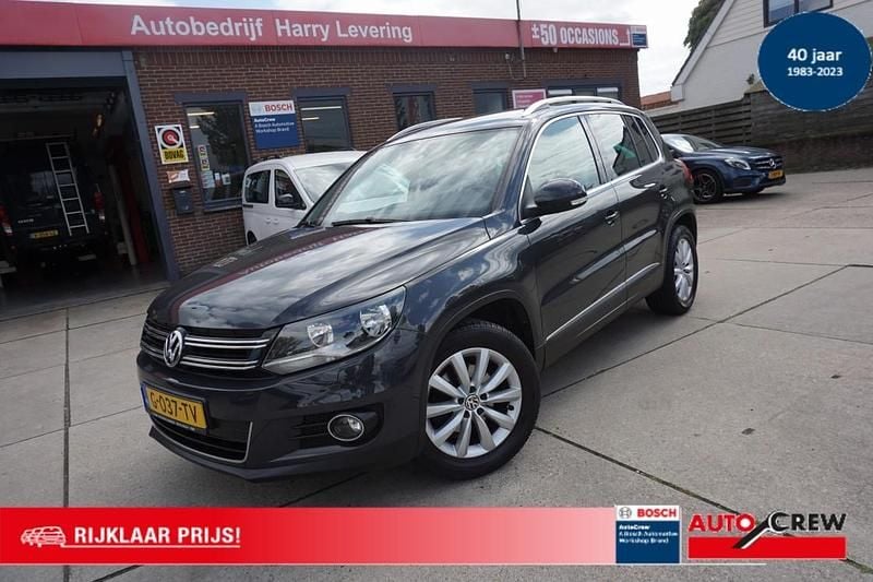 Grijs Gebruikt 2015 VW Tiguan Sportline SUV | € 13.950 (Eerlijke prijs) - Afbeelding 1/4