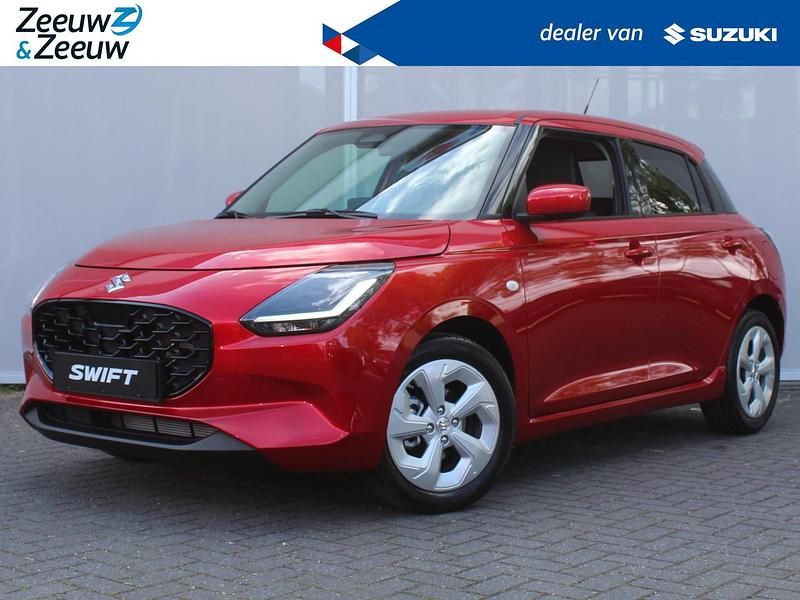 Oranje is gratis, andere kleuren tegen meerprijs Nieuw 2025 Suzuki Swift Hatchback | € 26.400 - Afbeelding 1/4