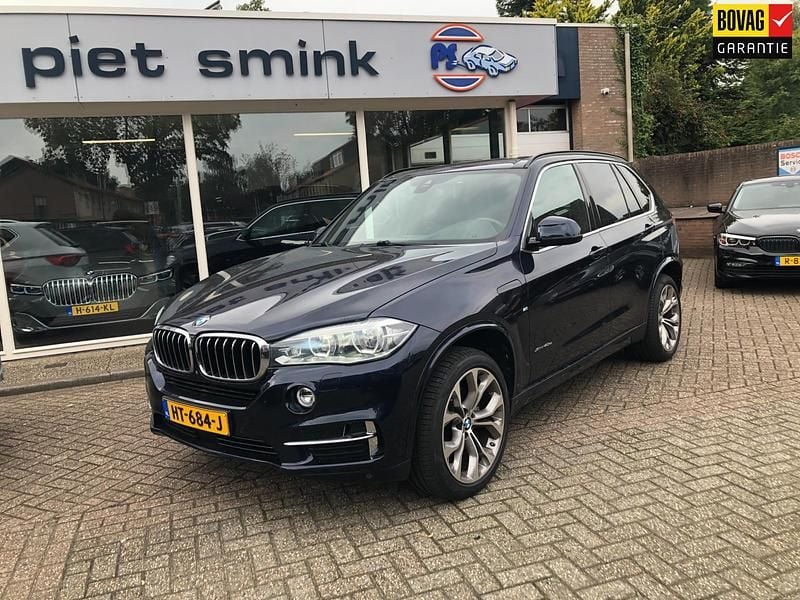 Blauw Occasion 2015 BMW X5 Executive SUV | € 22.900 - Afbeelding 1/4
